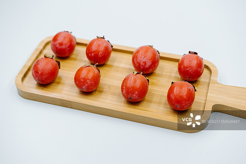 秋天绿色健康水果柿子图片素材