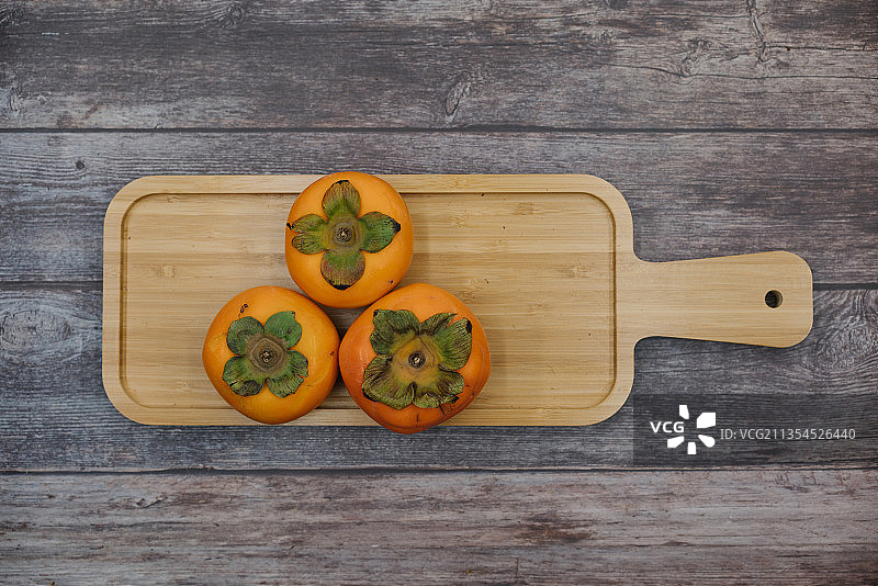 秋天绿色健康水果柿子图片素材