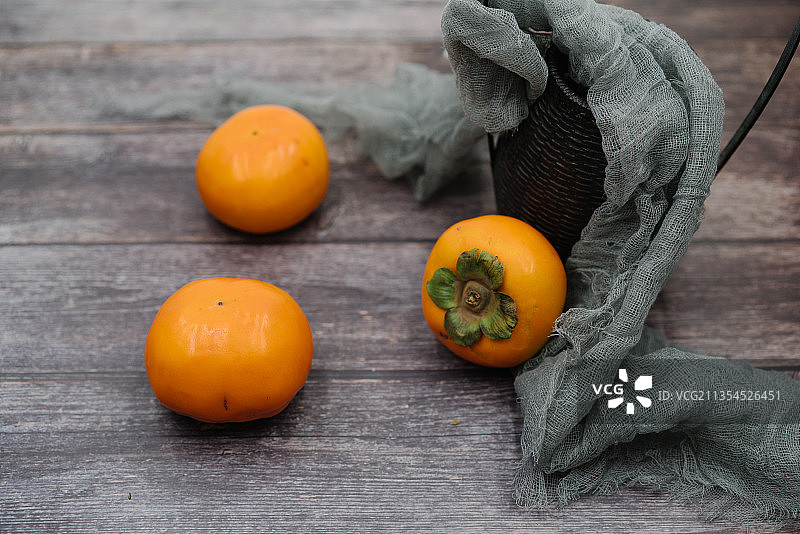 秋天绿色健康水果柿子图片素材