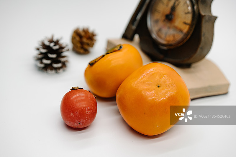 秋天绿色健康水果柿子图片素材