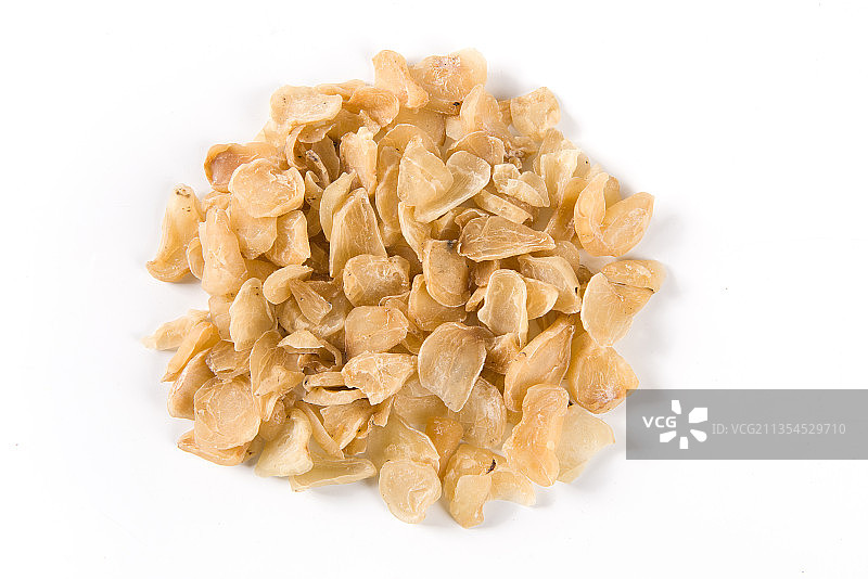 底上的中药材白附子片图片素材