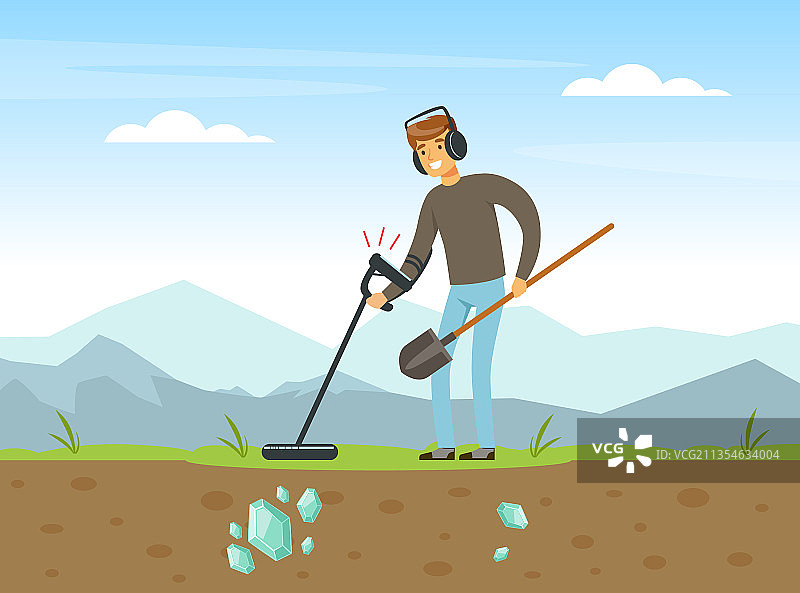 男人用铲子和金属探测器寻宝图片素材