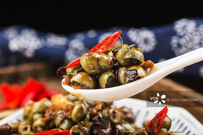 一盘炒田螺图片素材