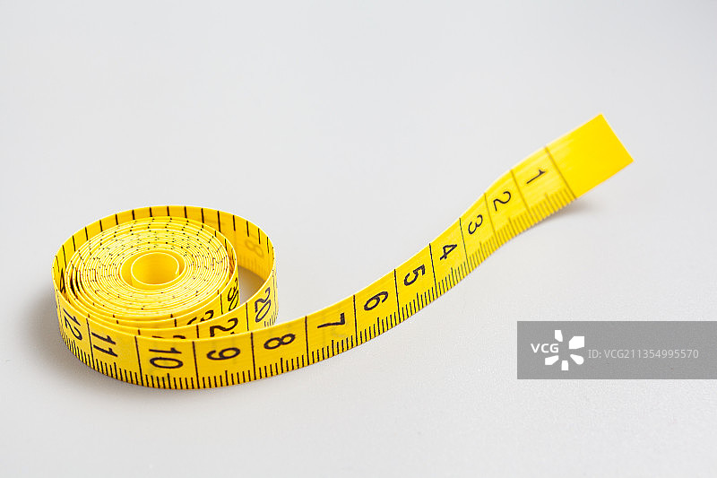 黄颜色测量皮尺静物图片素材