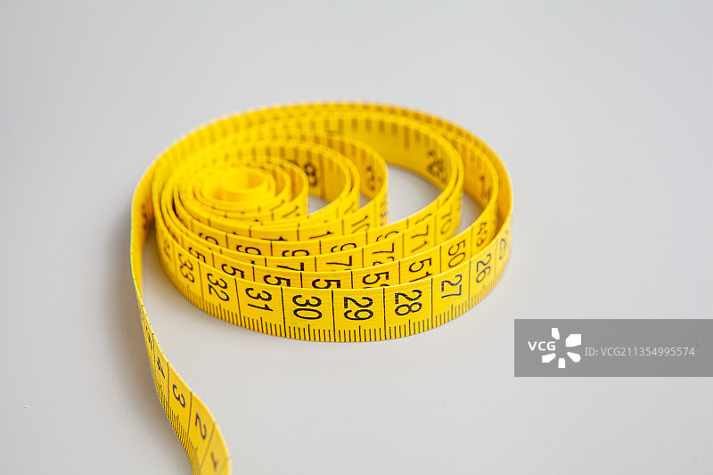 黄颜色测量皮尺静物图片素材