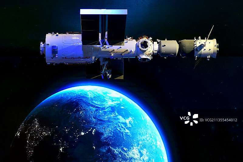 空间站核心舱与地球背景图片素材