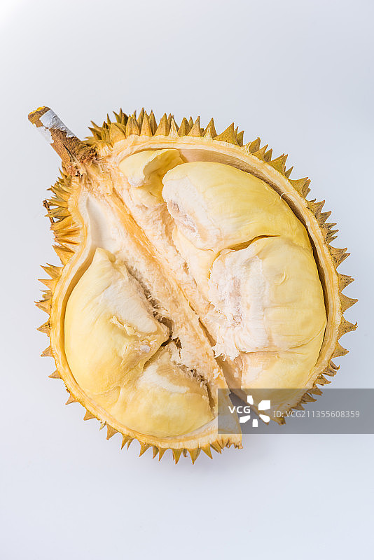 一个拨开皮的新鲜榴莲特写图片素材