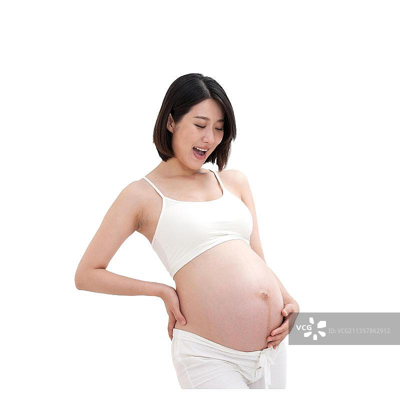 孕妇站在镜子前面图片素材