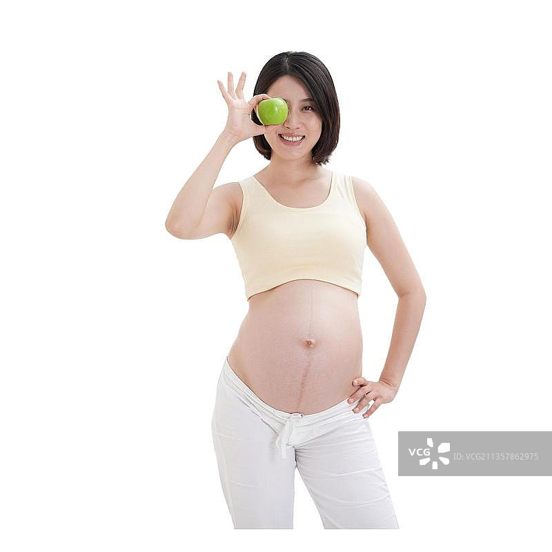 孕妇拿着苹果图片素材