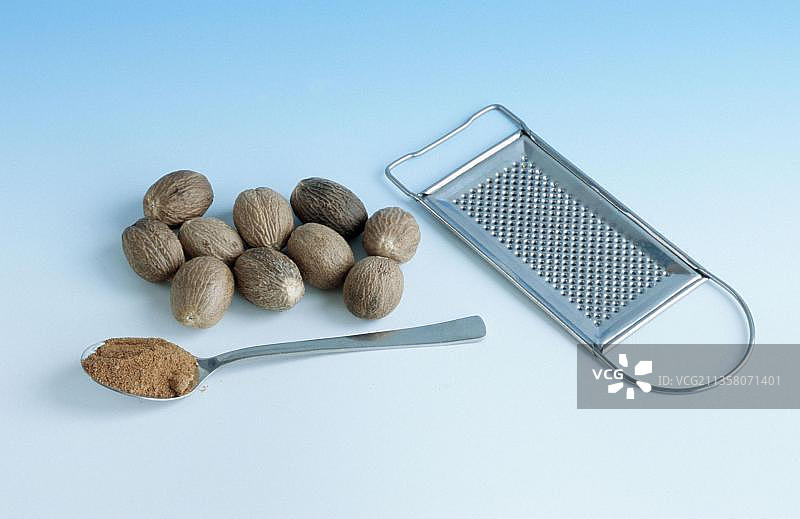 肉豆蔻苹果和磨 Grater图片素材