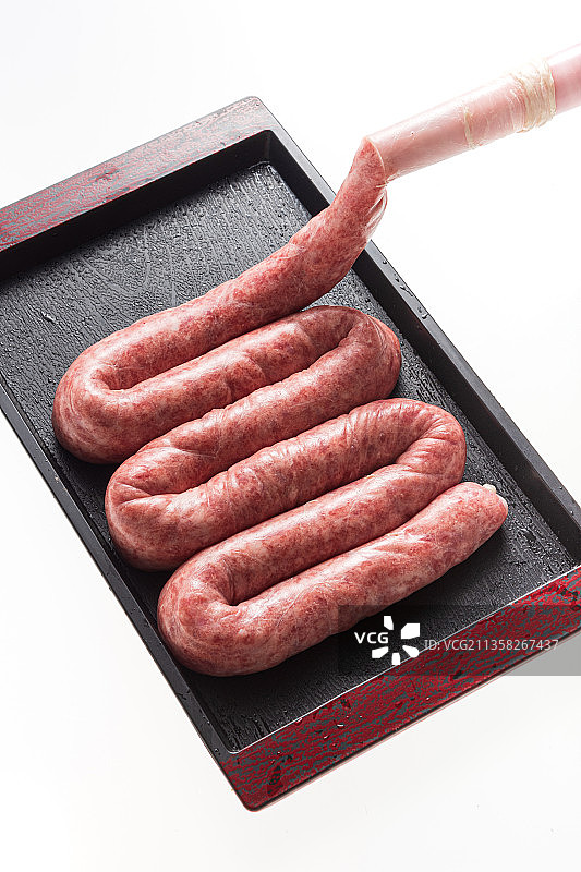 白背景灌香肠图片素材