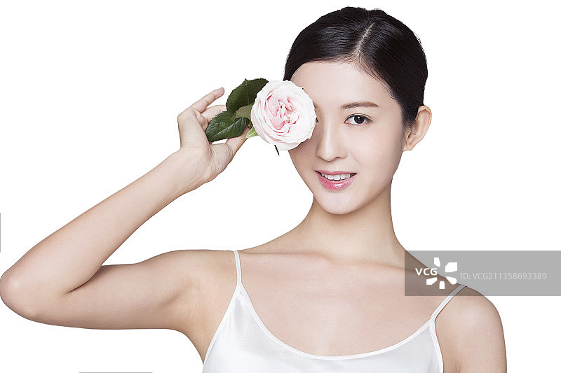 美丽的年轻女子与玫瑰花图片素材