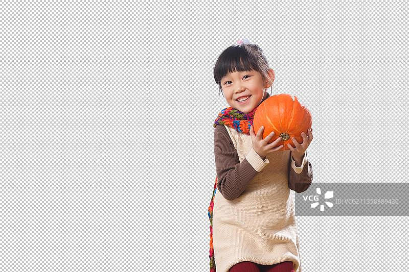 抱着南瓜的东方儿图片素材