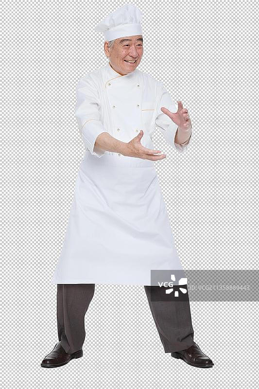 一个穿着厨师服的老年男人图片素材