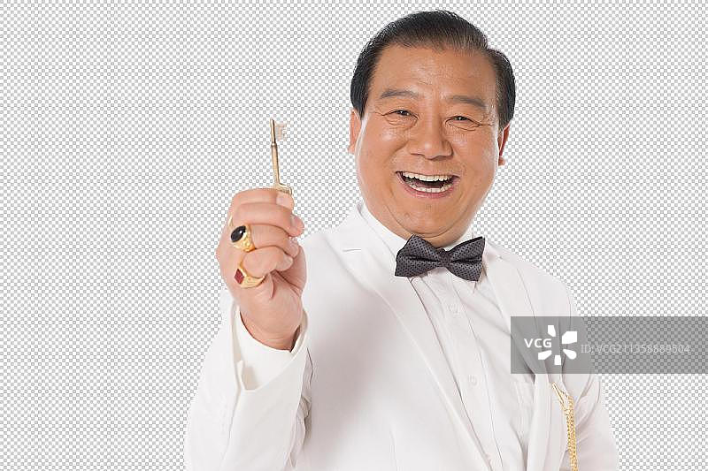 成功男人拿着金钥匙图片素材