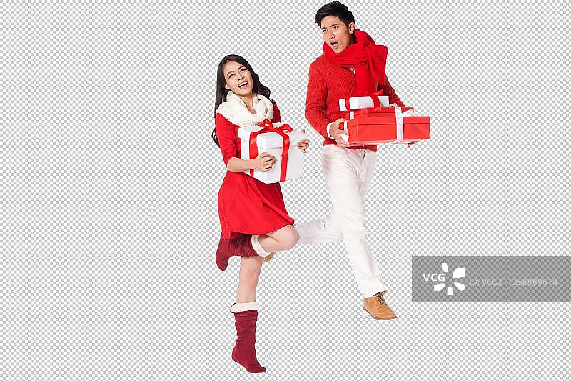 青年情侣拿着圣诞节礼物图片素材
