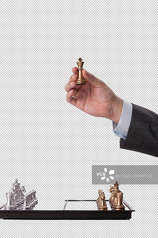 商务男人拿着国际象棋图片素材