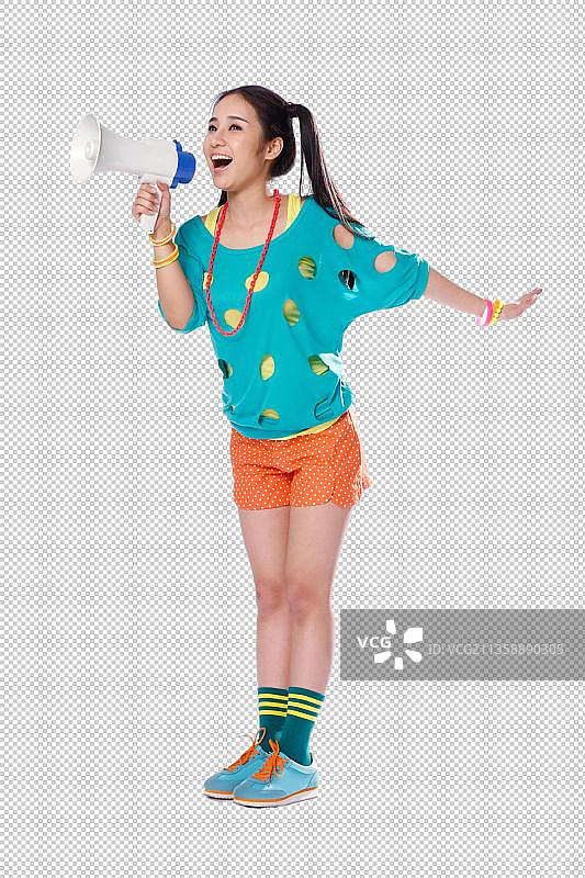 年轻女孩手拿扩音器呐喊图片素材
