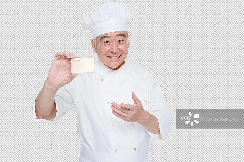 穿着厨师服老年男人拿着卡片图片素材