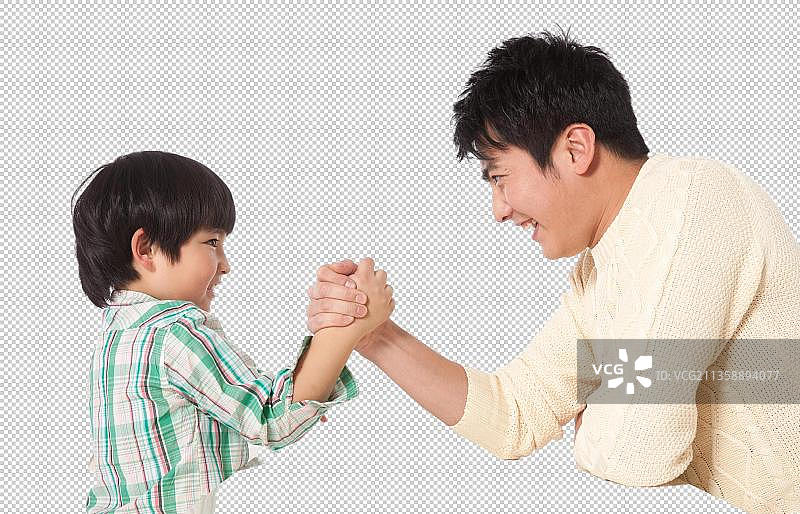 父亲和儿子在扳手腕图片素材