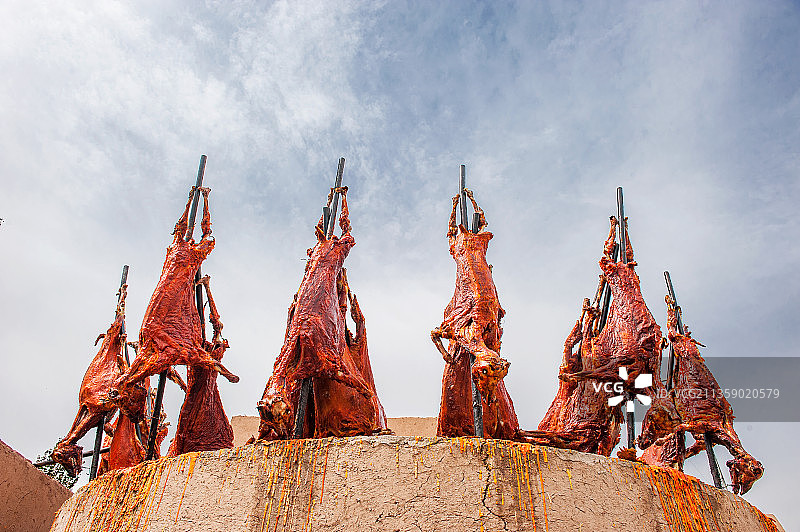 馕坑烤全羊图片素材