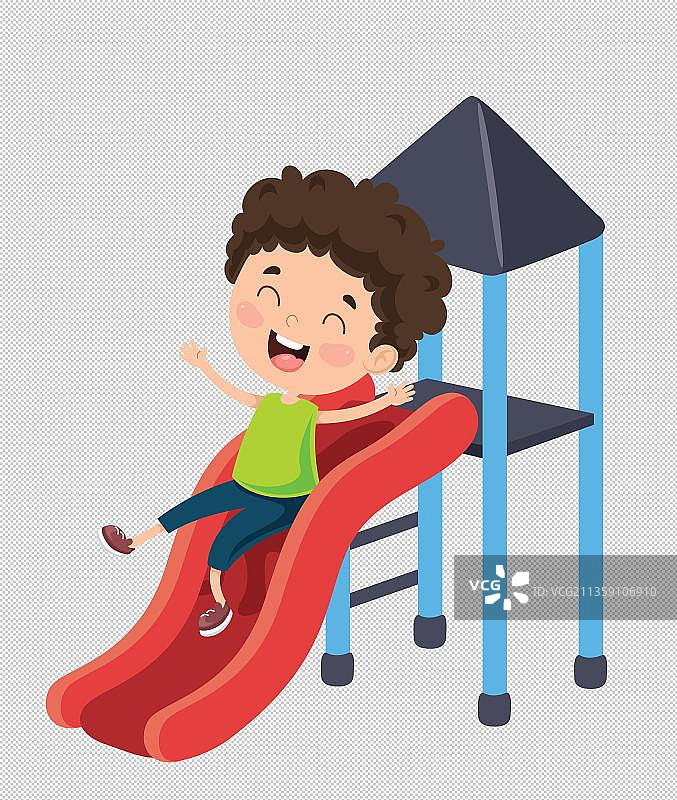 正在玩滑滑梯的开心的男孩图片素材