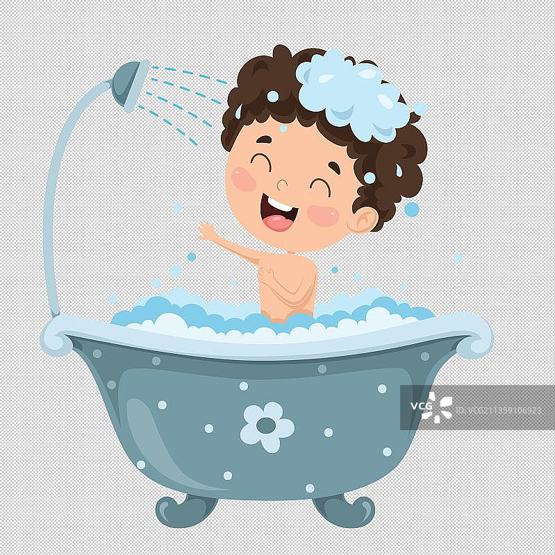 正在浴缸里洗泡泡浴的男孩图片素材
