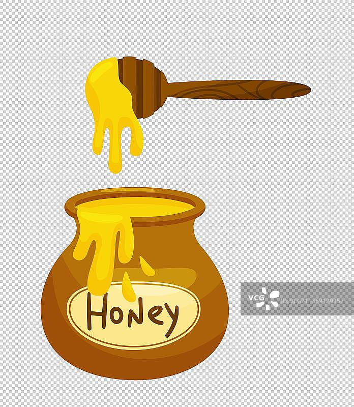 打开的蜂蜜罐搅拌棒图片素材