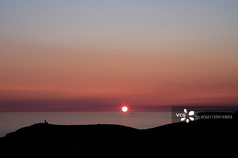 英国东萨塞克斯郡日落海景图片素材