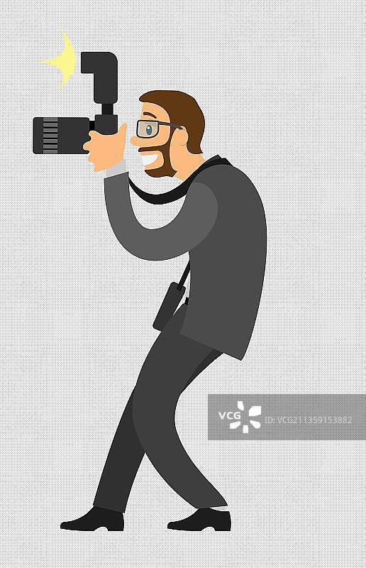拿着照相机拍摄的男人图片素材
