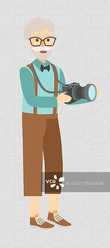拿着单反相机拍照的老人图片素材