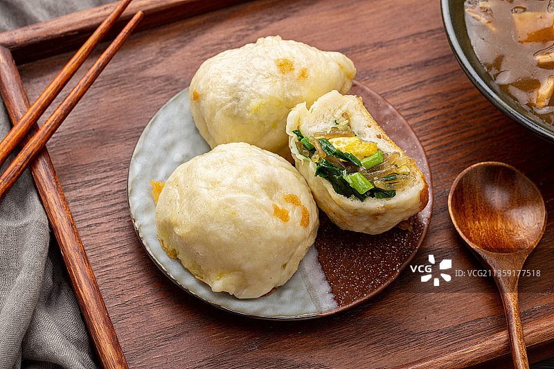 韭菜鸡蛋馅水煎包图片素材