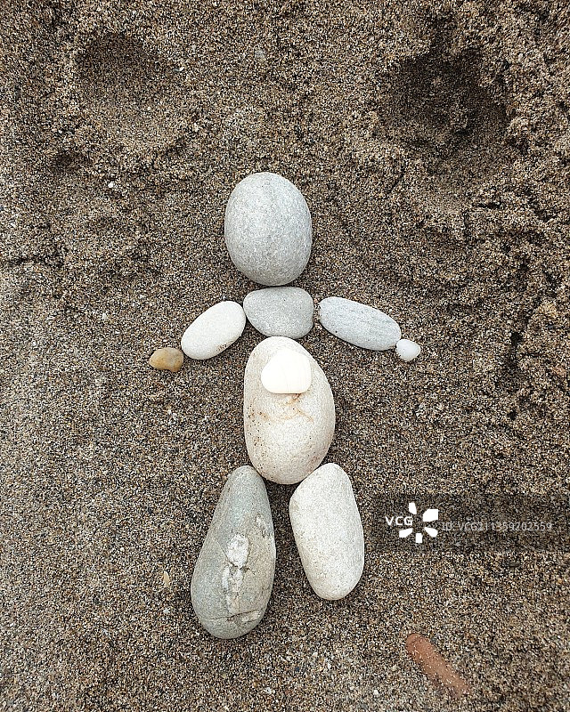 海滩上的鹅卵石俯视照片图片素材