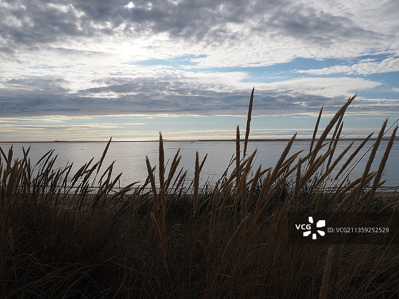 法国皮拉沙丘日落时分的海景风光图片素材