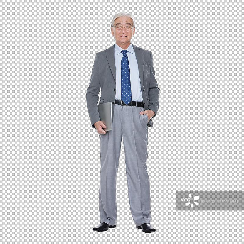 商务老年男人拿着笔记本电脑图片素材