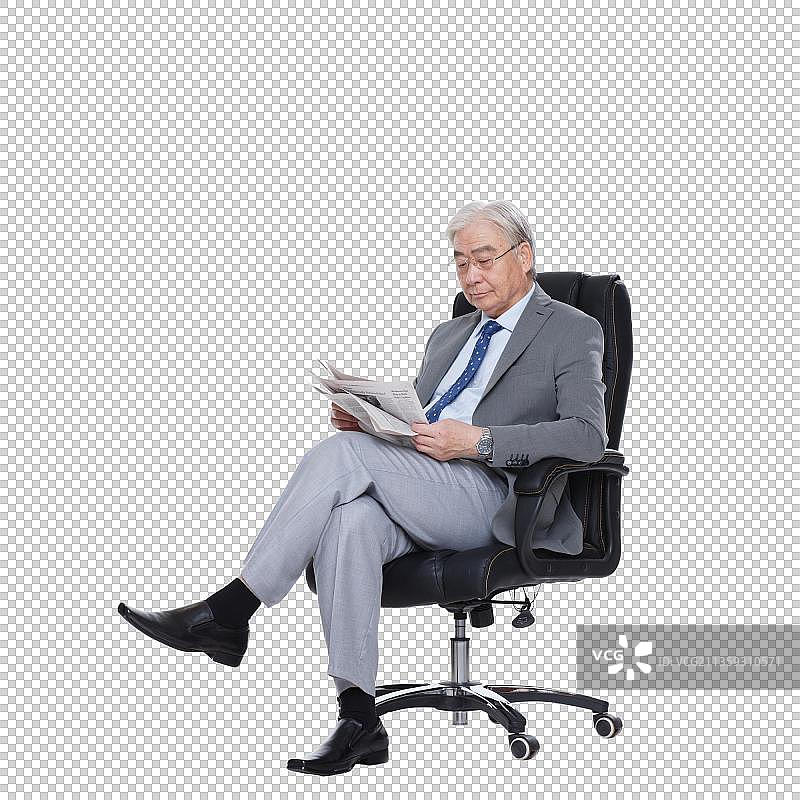 商务老年男人在看报纸图片素材
