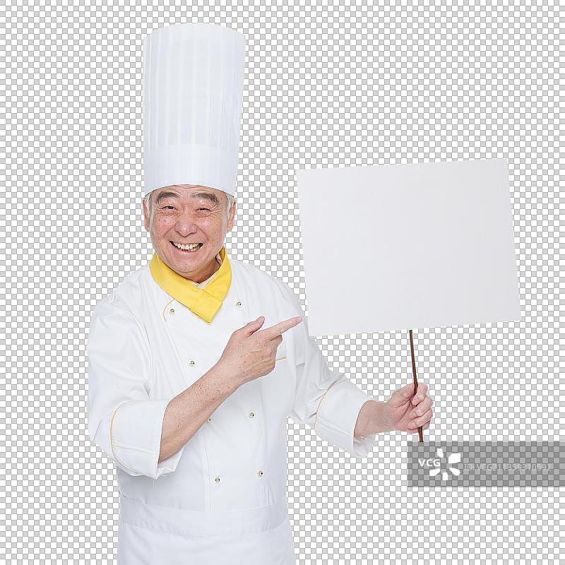 穿着厨师服的老年男人拿着白板图片素材