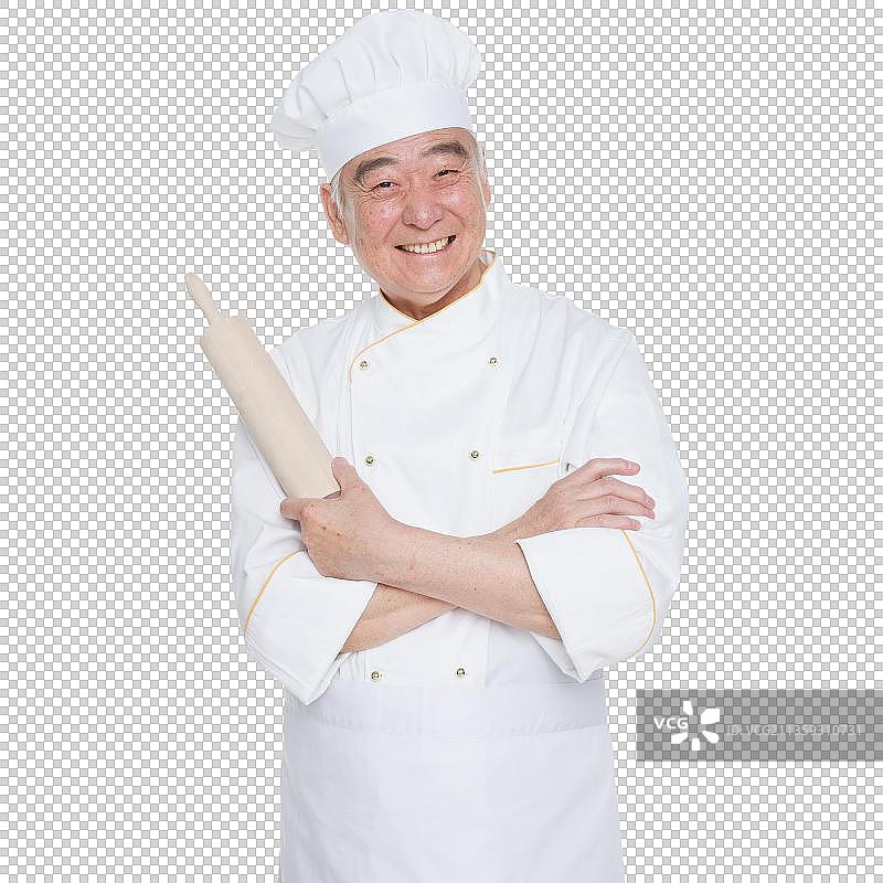 一个老年男人穿着厨师服拿着厨具图片素材