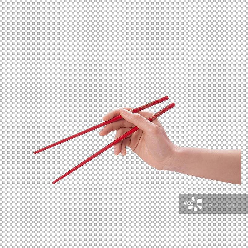 手拿筷子图片素材