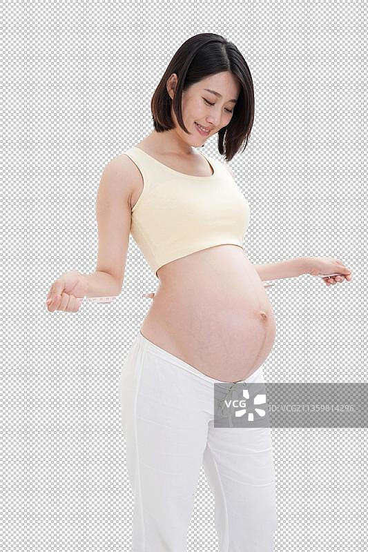 孕妇量腰围图片素材