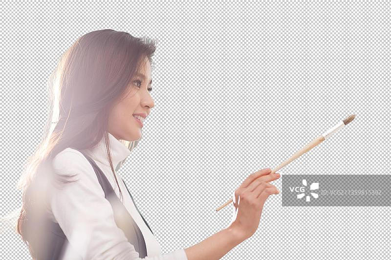 青春活力的年轻女人快乐工作图片素材