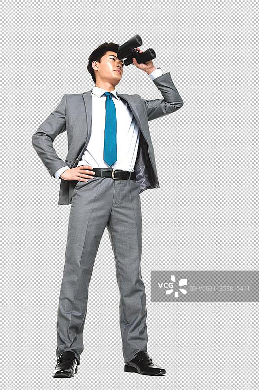 商务青年男人拿着望远镜图片素材