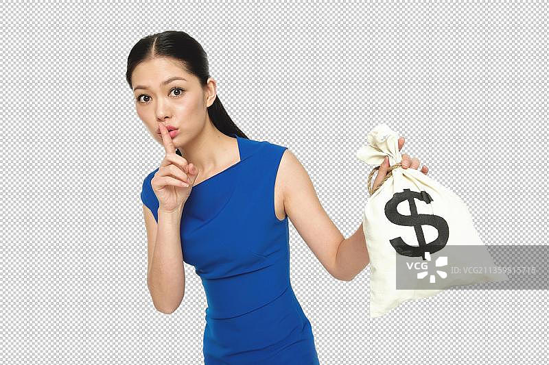 青年女人食指放在嘴唇上图片素材