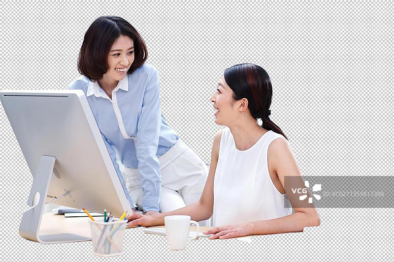 年轻的商务女性在办公室快乐工作图片素材