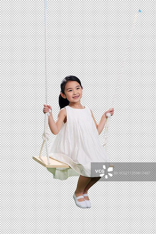 东方女孩荡秋千图片素材