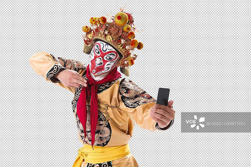 京剧里的人物孙悟空拿着手机图片素材
