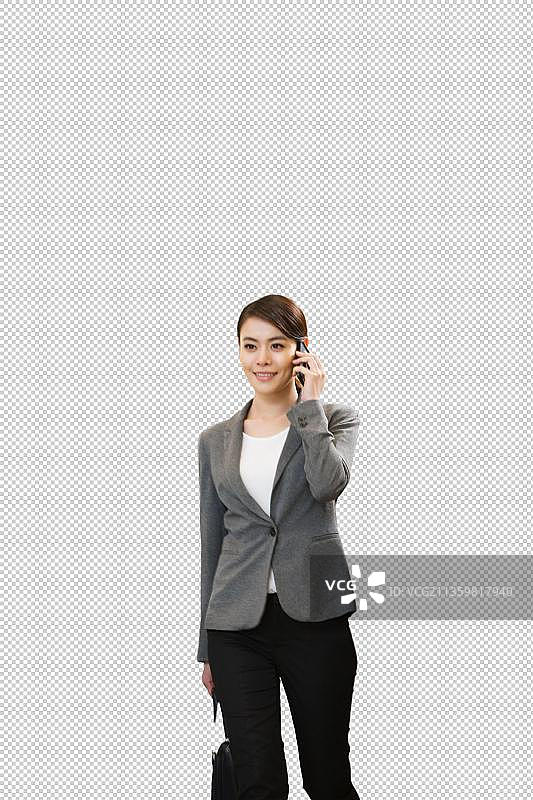 商务女士通过闸机打电话图片素材