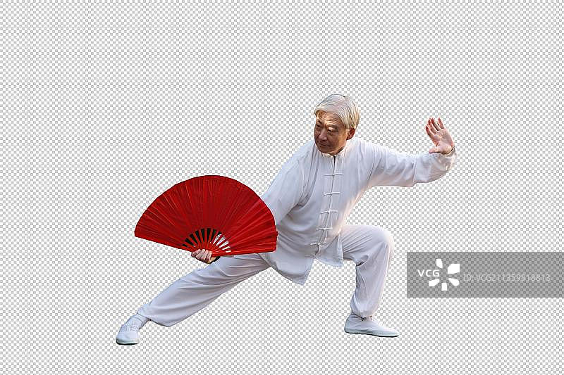 一个老年男人拿着折扇在晨练图片素材