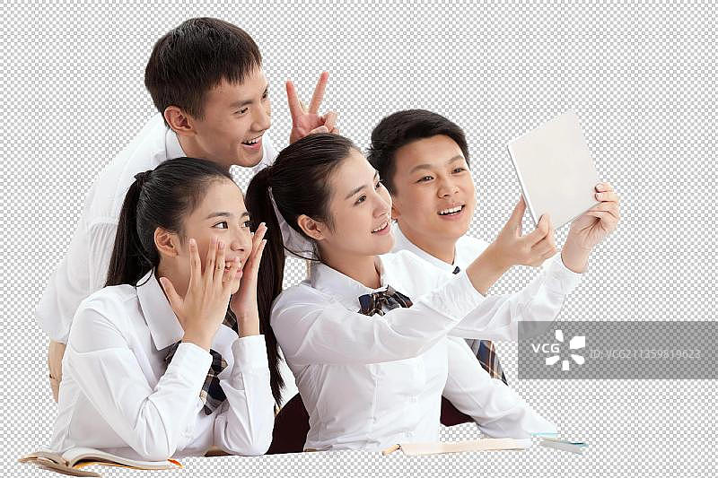 中学生拿着平板电脑自拍图片素材