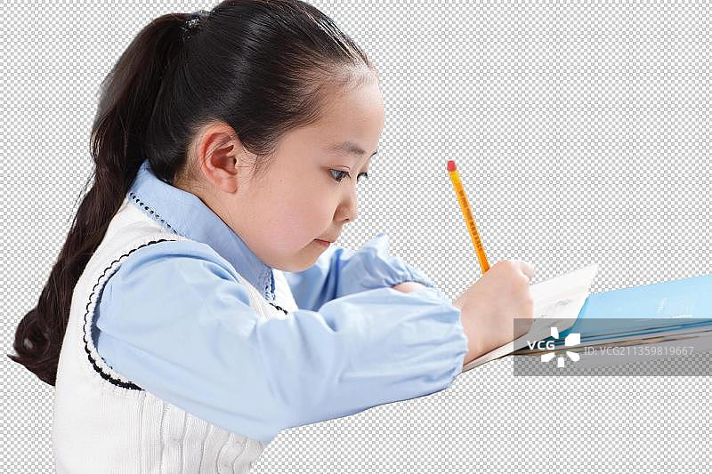 小学生在教室里写作业图片素材